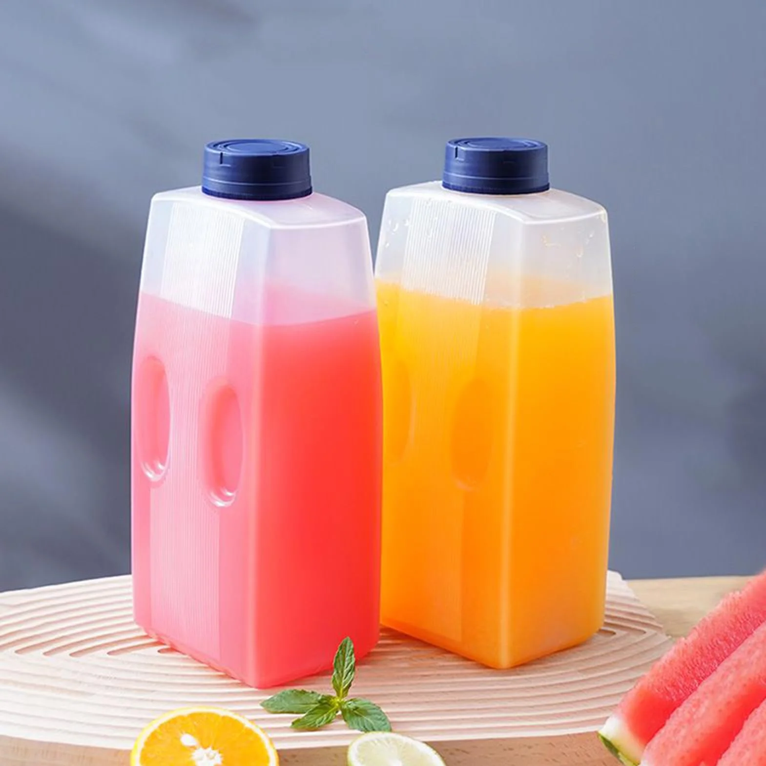 Bouteilles de jus en plastique transparent - Contenants de boissons réutilisables vides empilables